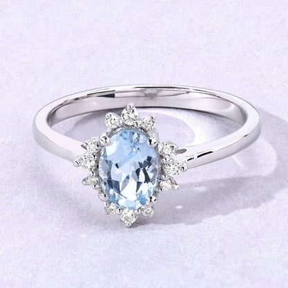 0.60 Ct Oval Blue Aquamarine and Lab Diamond Silver Halo Statement Ring