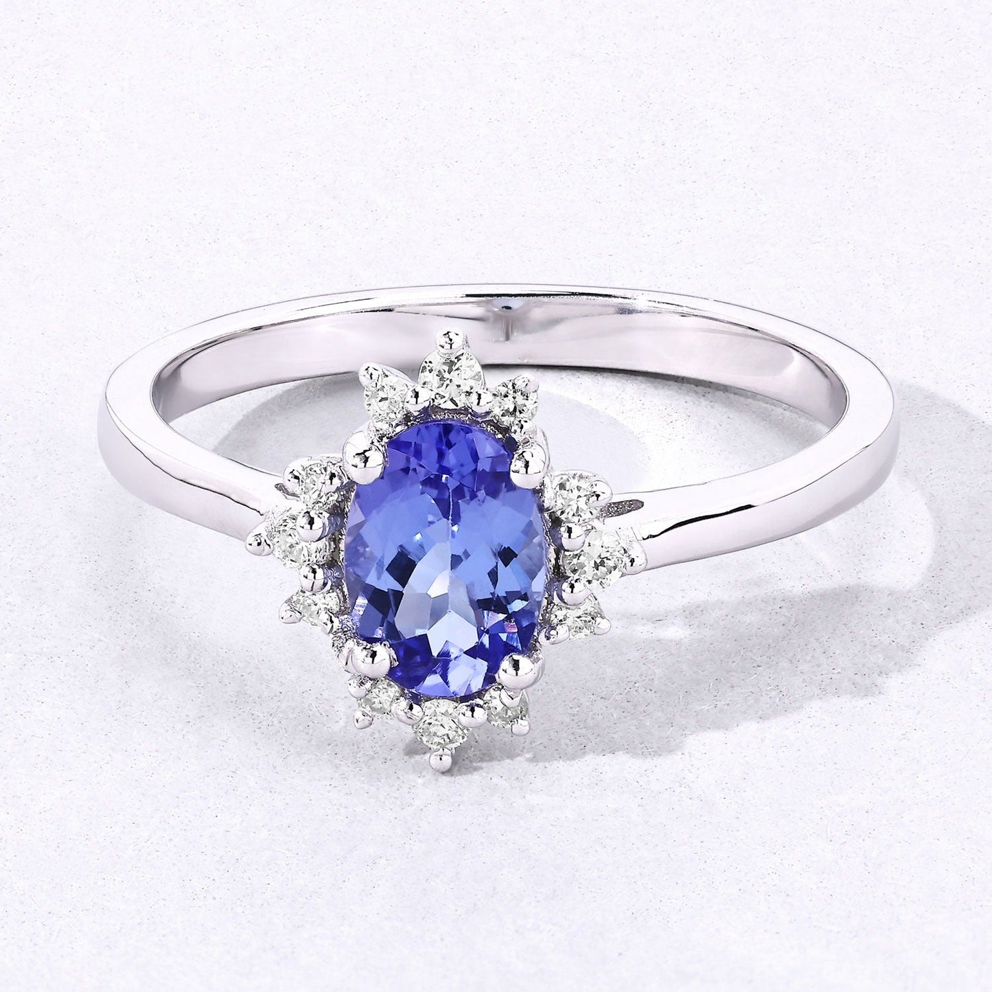 0.75 Ct Oval Violet Tanzanite and Lab Diamond Prong Silver Halo Statement Ring
