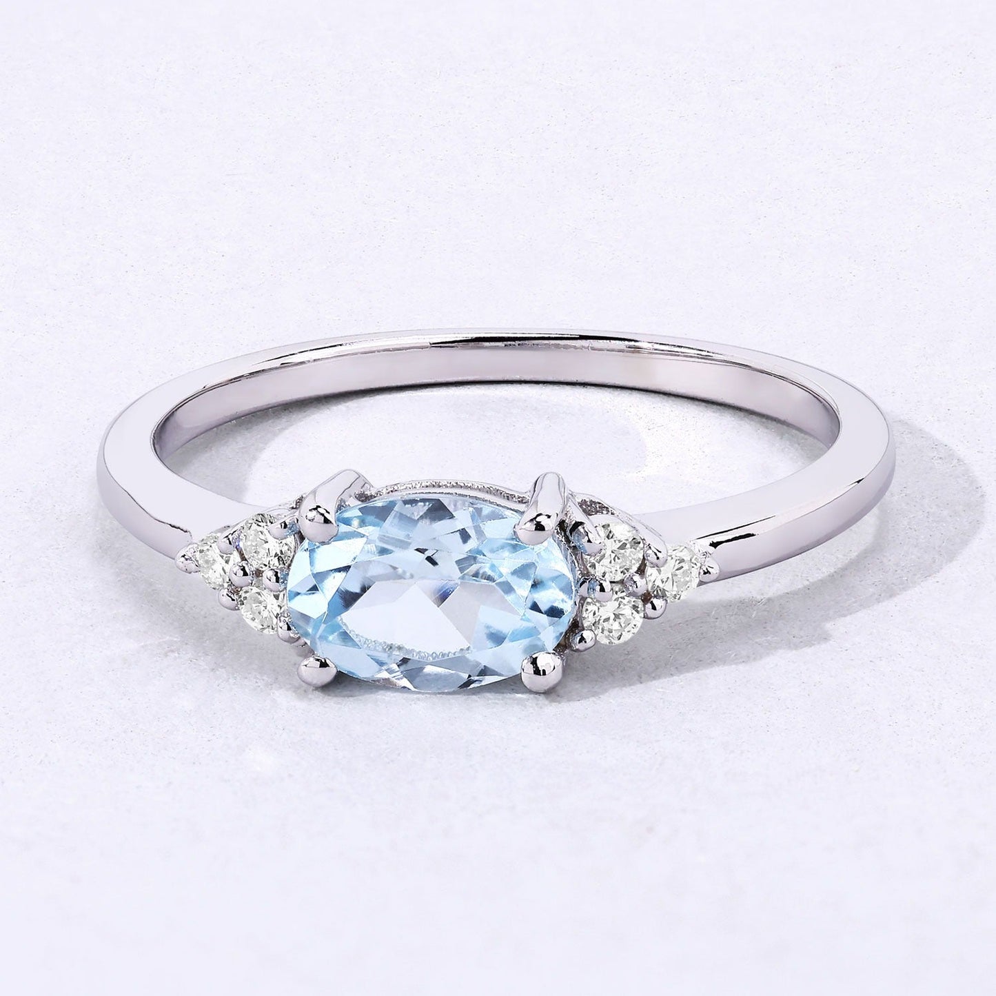0.60 Ct Oval Blue Aquamarine and Lab Diamond Prong Sterling Silver Cocktail Ring