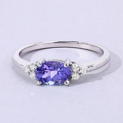 0.75 Ct Oval Violet Tanzanite and Lab Diamond Prong Silver Cocktail Ring