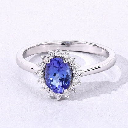 0.75 Ct Oval Violet Tanzanite and Lab Grown Diamond Prong Silver Halo Ring