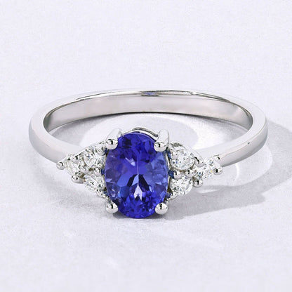 0.75 Ct Oval Violet Tanzanite and Lab Diamond Prong Silver Cocktail Ring