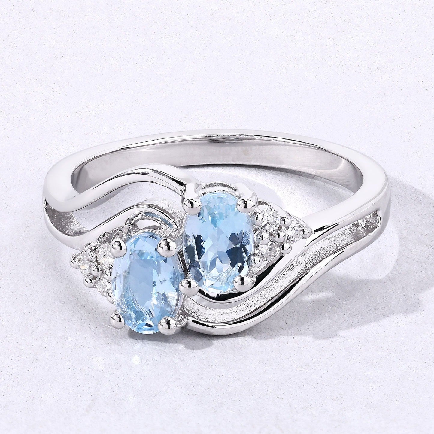 0.80 Ct Oval Blue Aquamarine and Lab Diamond Silver Bypass Promise Ring