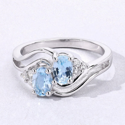 0.80 Ct Oval Blue Aquamarine and Lab Diamond Silver Bypass Promise Ring