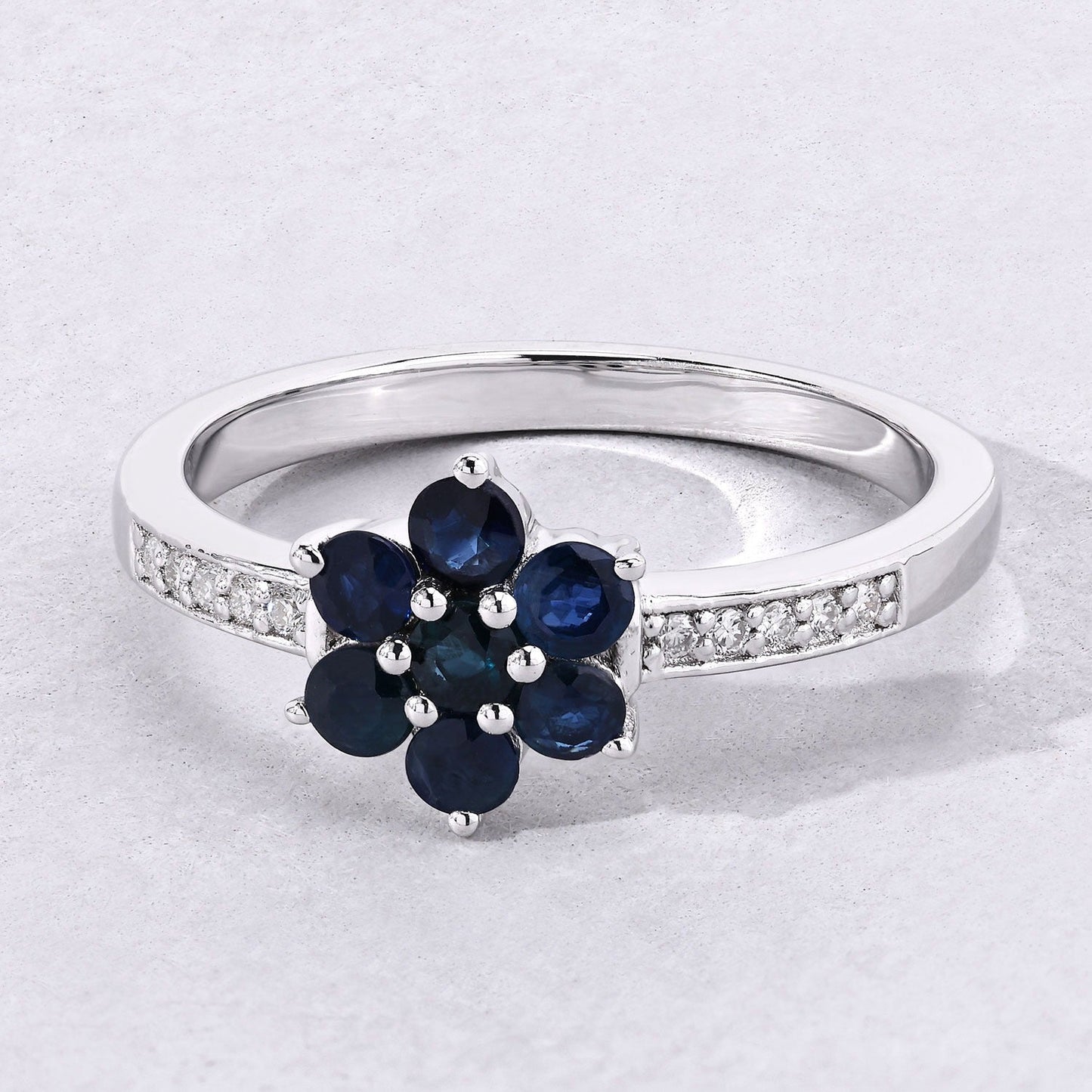 0.49 Ct Round Blue Sapphire and Lab Diamond Prong Silver Pave Floral Ring