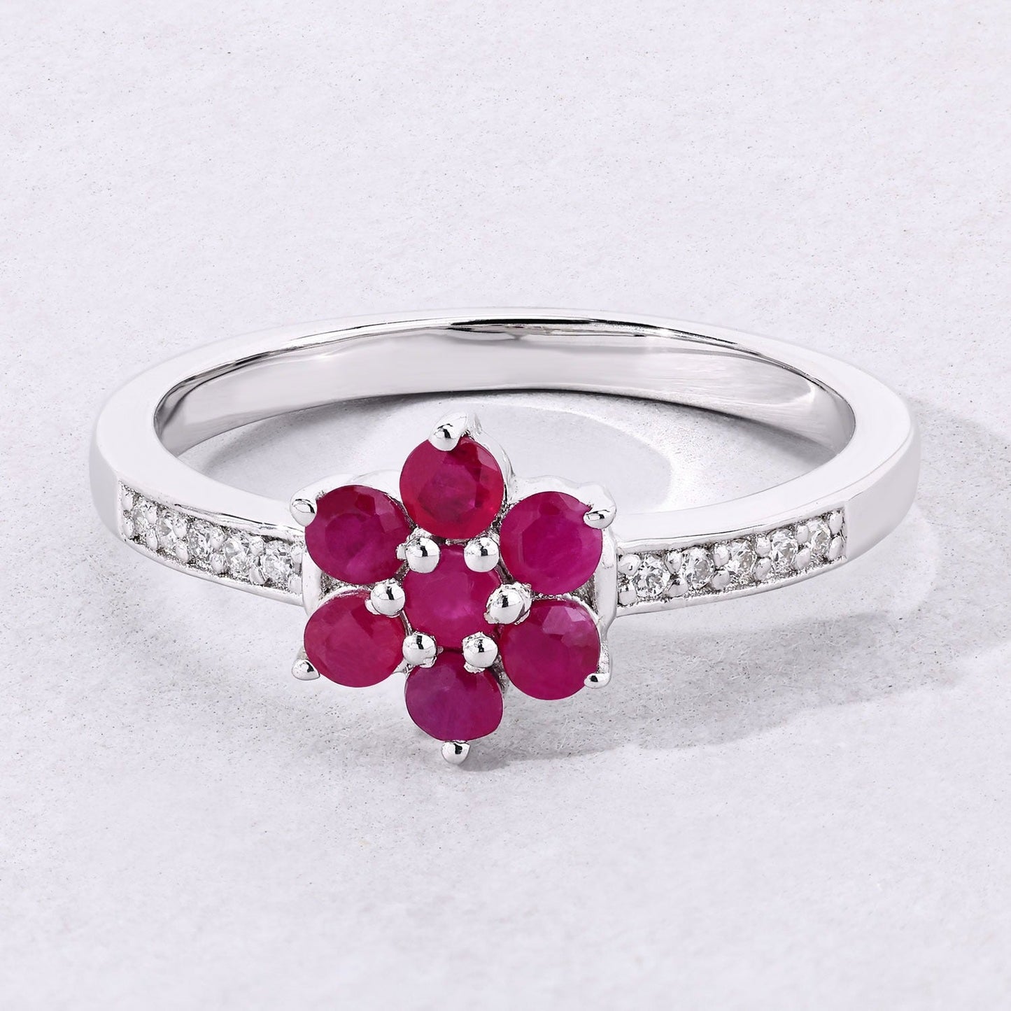 0.49 Ct Round Red Mozambique Ruby and Lab Diamond Prong Silver Pave Floral Ring