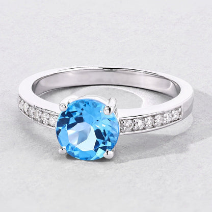 1.48 Ct Round Swiss Blue Topaz & Lab Diamond Prong Silver Pave Bridge Ring