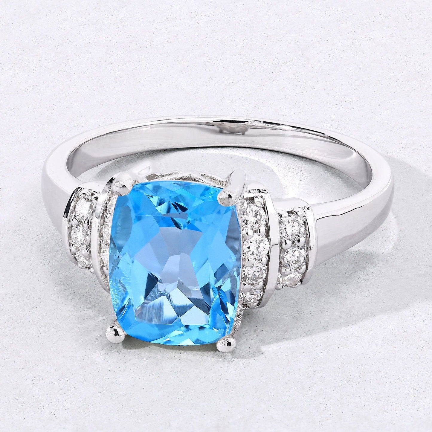 2.65 Ct Cushion Swiss Blue Topaz and Lab Diamond Prong Silver Bridge Ring