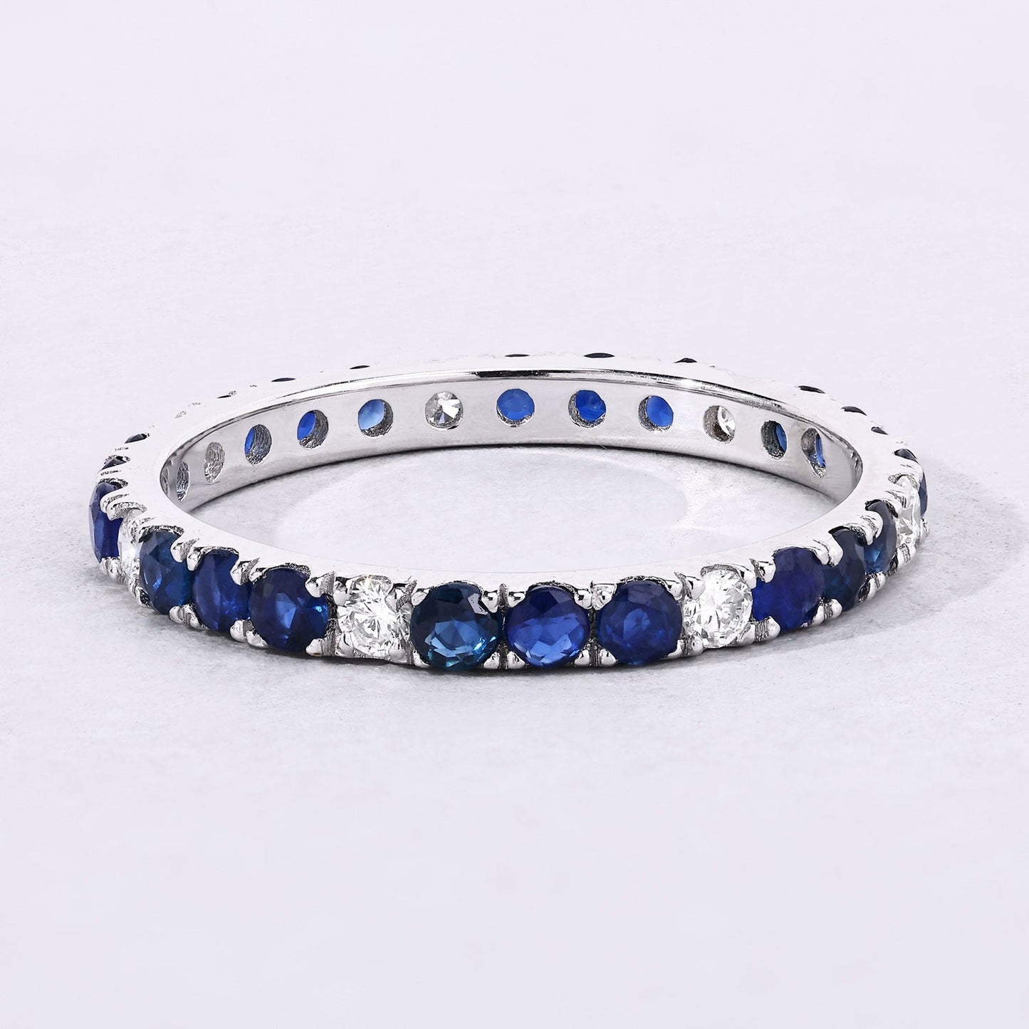 1.01 Ct Round Blue Sapphire and Lab Diamond Prong Silver Eternity Band Ring