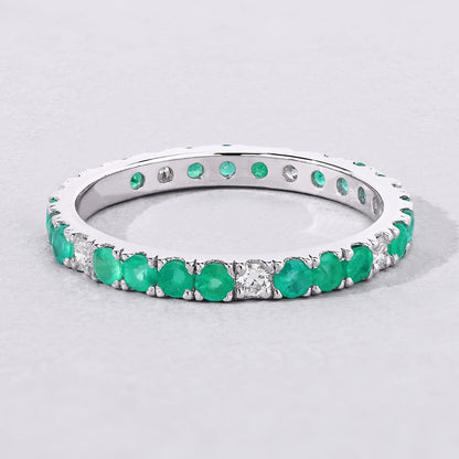 0.75 Ct Round Green Zambian Emerald and Lab Diamond Prong Silver Eternity Band Ring