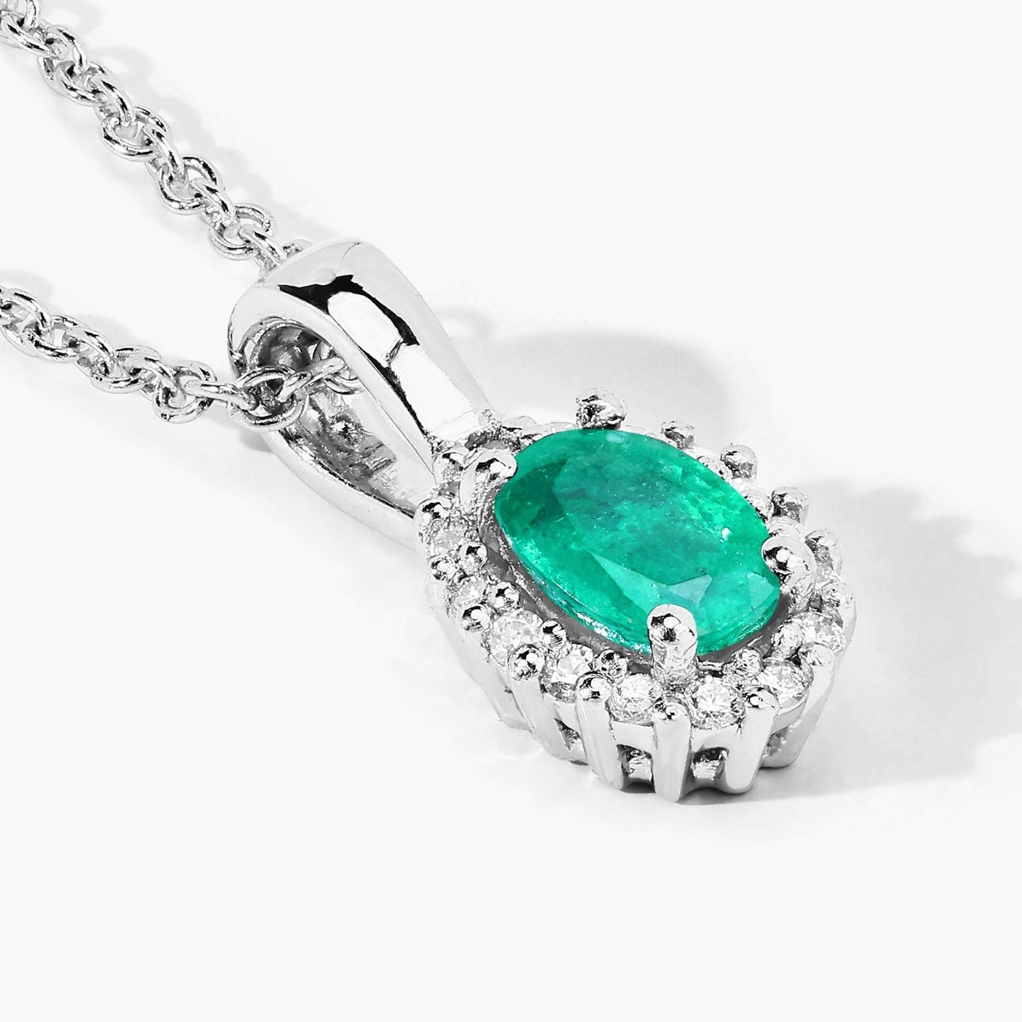 0.44 Ct oval green Zambian Emerald and Lab Diamond prong Silver Halo pendant Necklace