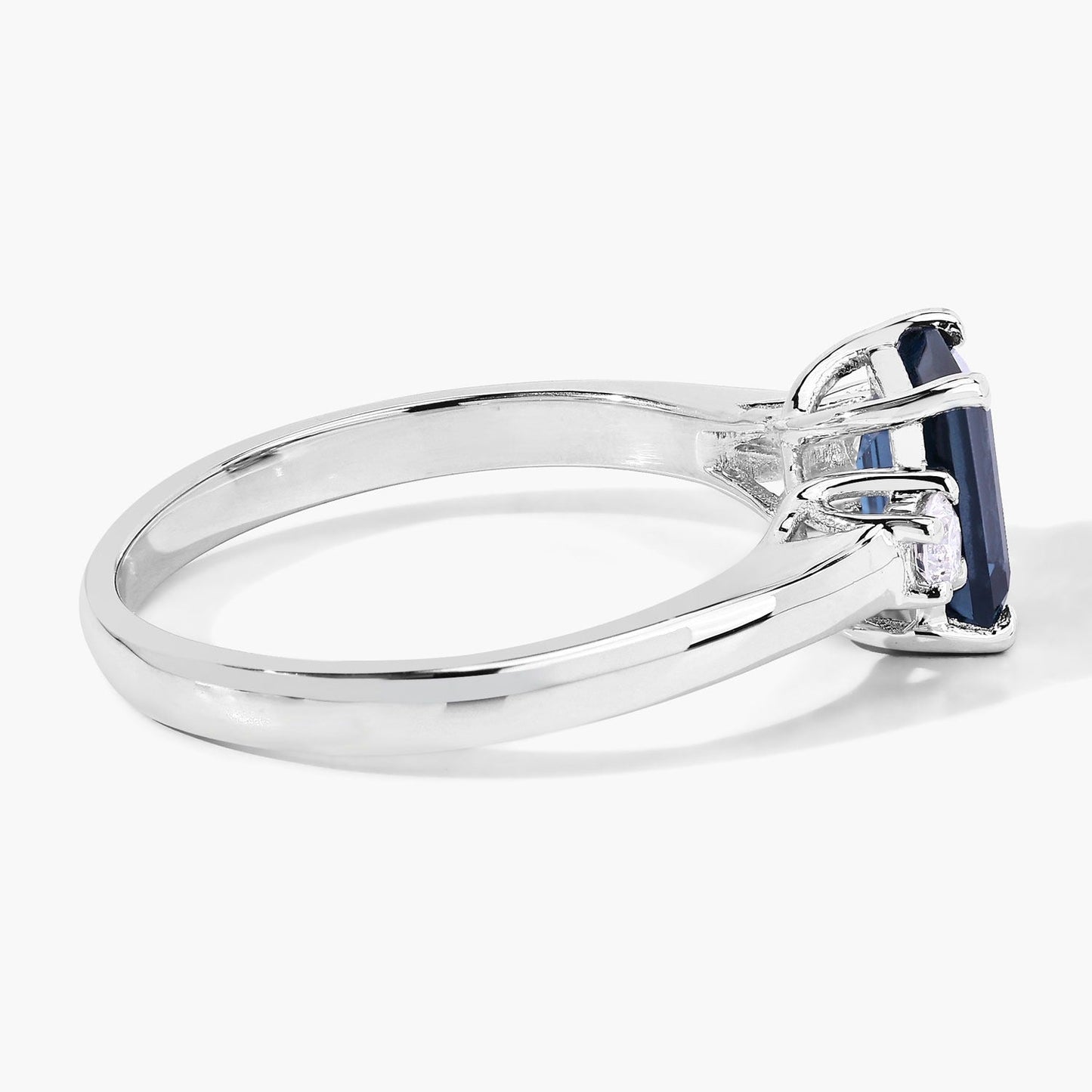 1.07 Ct Octagon London Blue Topaz and Diamond Prong Silver Three Stone Ring