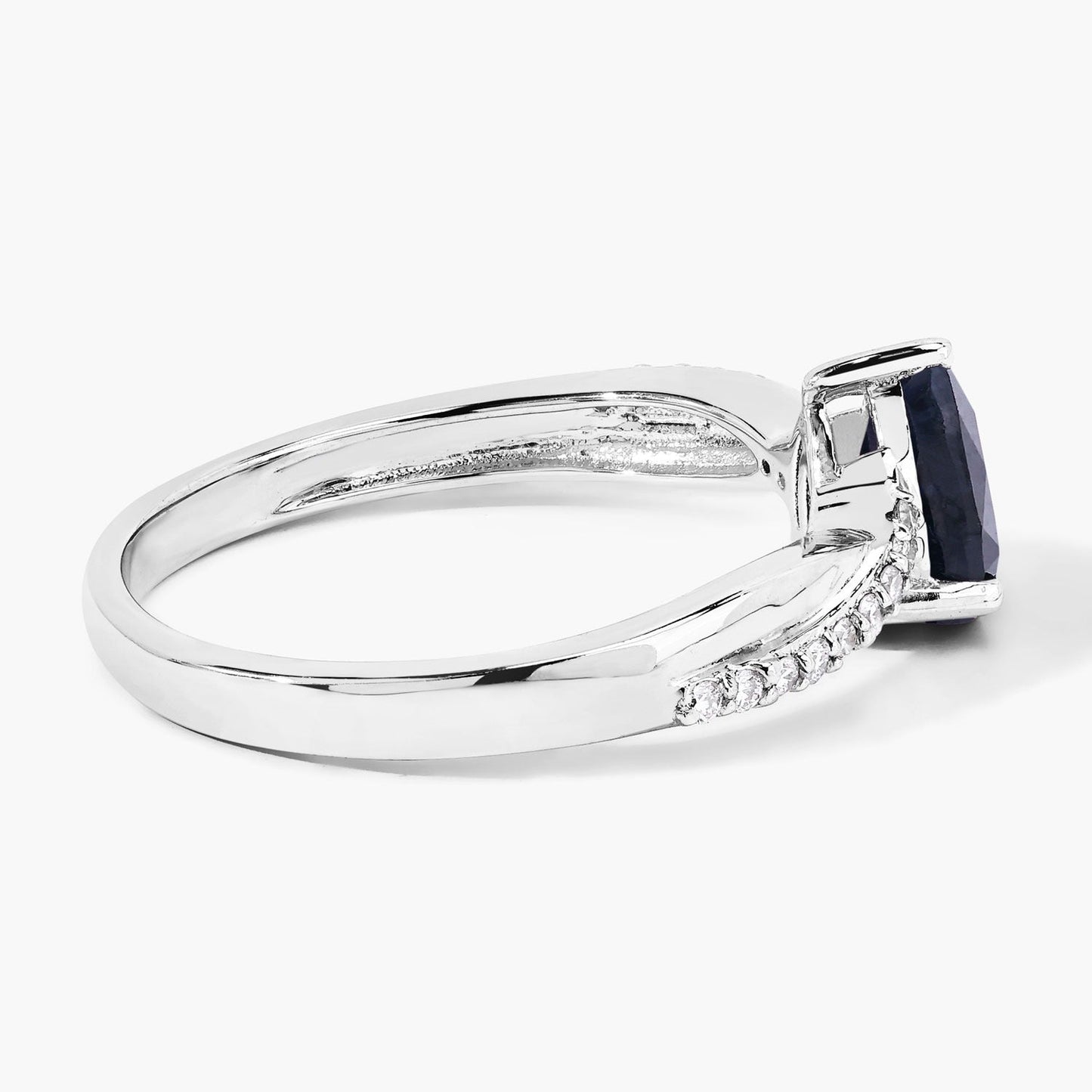 0.80 Ct Pear Blue Sapphire and Lab Diamond Prong Silver Pave Crossover Ring