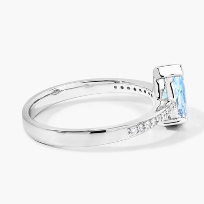 0.80 Ct Pear Blue Aquamarine and Lab Diamond V-Prong Silver Pave Bridge Ring