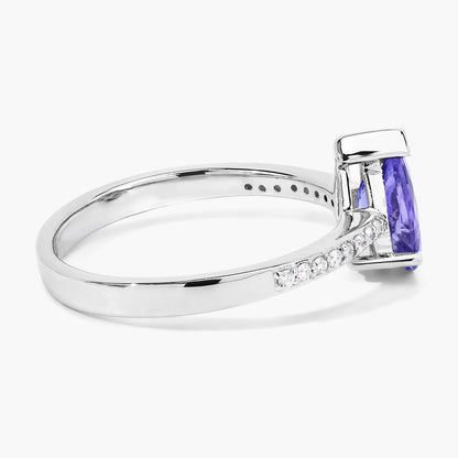 0.78 Ct Pear Violet Tanzanite and Lab Diamond V-Prong Silver Pave Bridge Ring