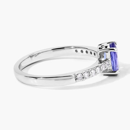 0.75 Ct Oval Violet Tanzanite and Lab Diamond Prong Silver Pave Band Ring