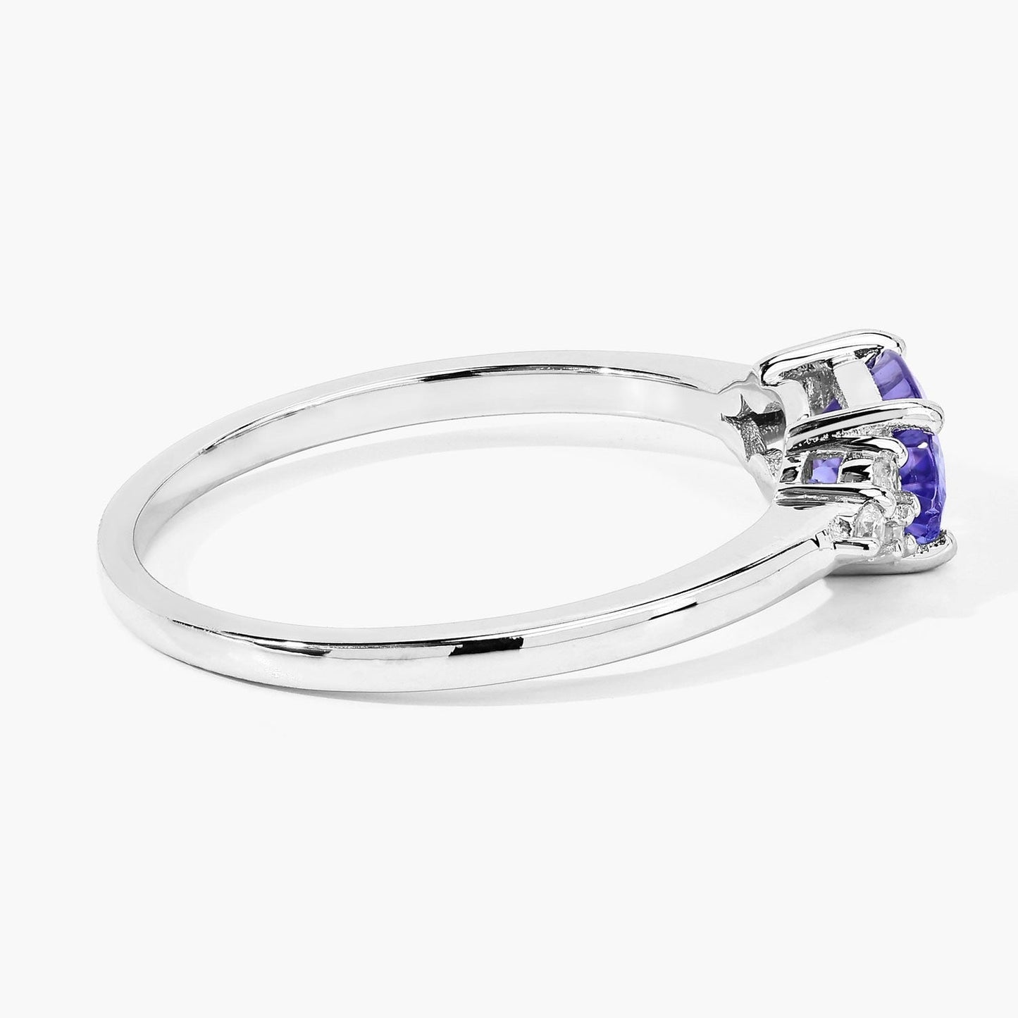 0.75 Ct Oval Violet Tanzanite and Lab Diamond Prong Silver Cocktail Ring