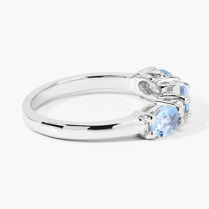 0.87 Ct Oval Blue Aquamarine and Lab Diamond Prong Silver Five Stone Ring