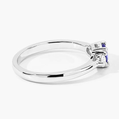 0.47 Ct Round Violet Tanzanite & Lab Diamond Prong Silver Three Stone Ring