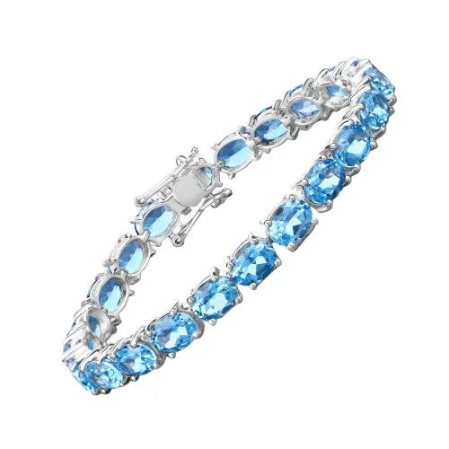 35.20 Ct Oval Swiss Blue Topaz Prong Sterling Silver Tennis Bracelet