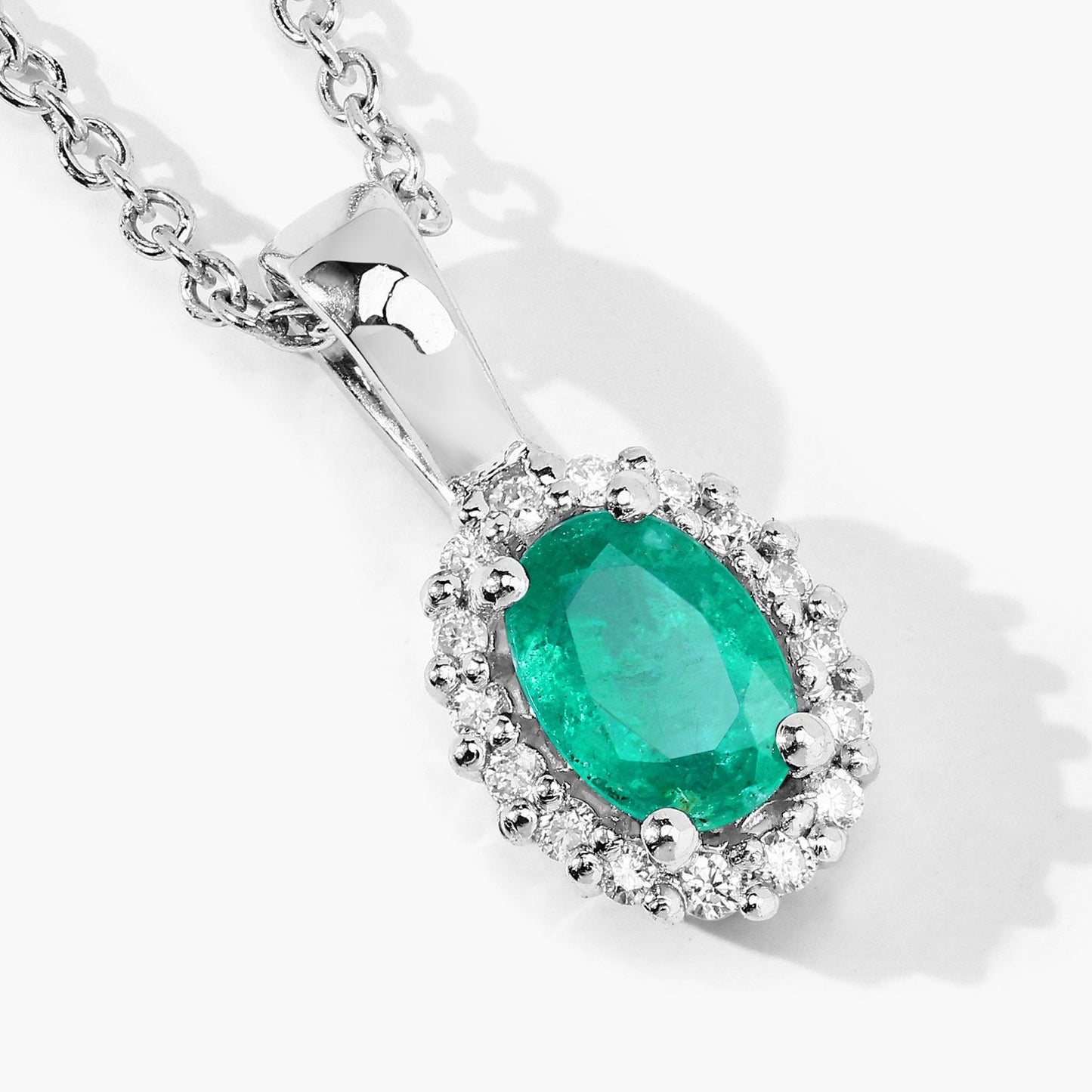 0.44 Ct oval green Zambian Emerald and Lab Diamond prong Silver Halo pendant Necklace