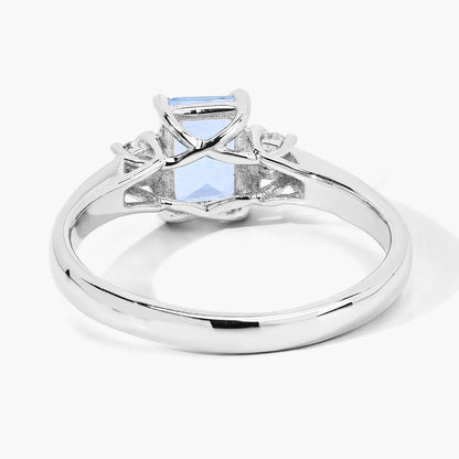 0.80 Ct Octagon Blue Aquamarine and Lab Diamond Prong Silver Three Stone Ring