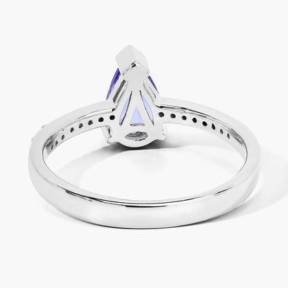 0.78 Ct Pear Violet Tanzanite and Lab Diamond V-Prong Silver Pave Bridge Ring