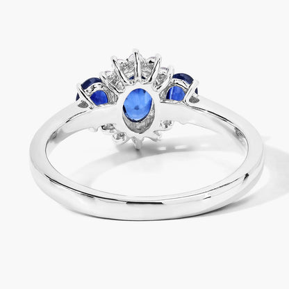 0.99 Ct Oval Blue Sapphire and Lab Diamond Prong Silver Three Stone Cocktail Ring