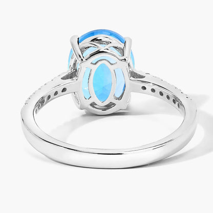 2.55 Ct Oval Swiss Blue Topaz & Lab Diamond Silver Pave Bridge Ring