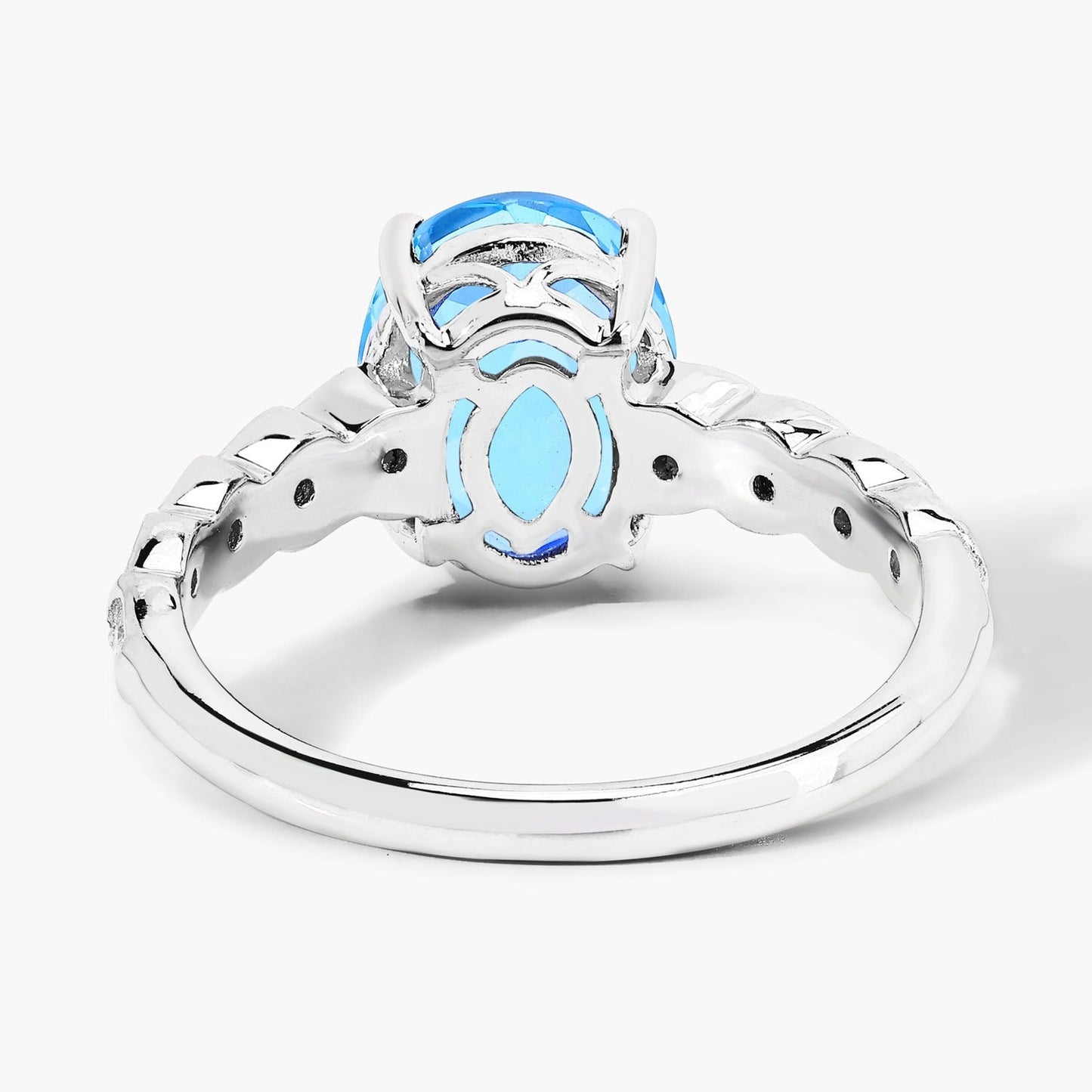 2.55 Ct Oval Swiss Blue Topaz and Lab Diamond Prong Silver Bridge Ring