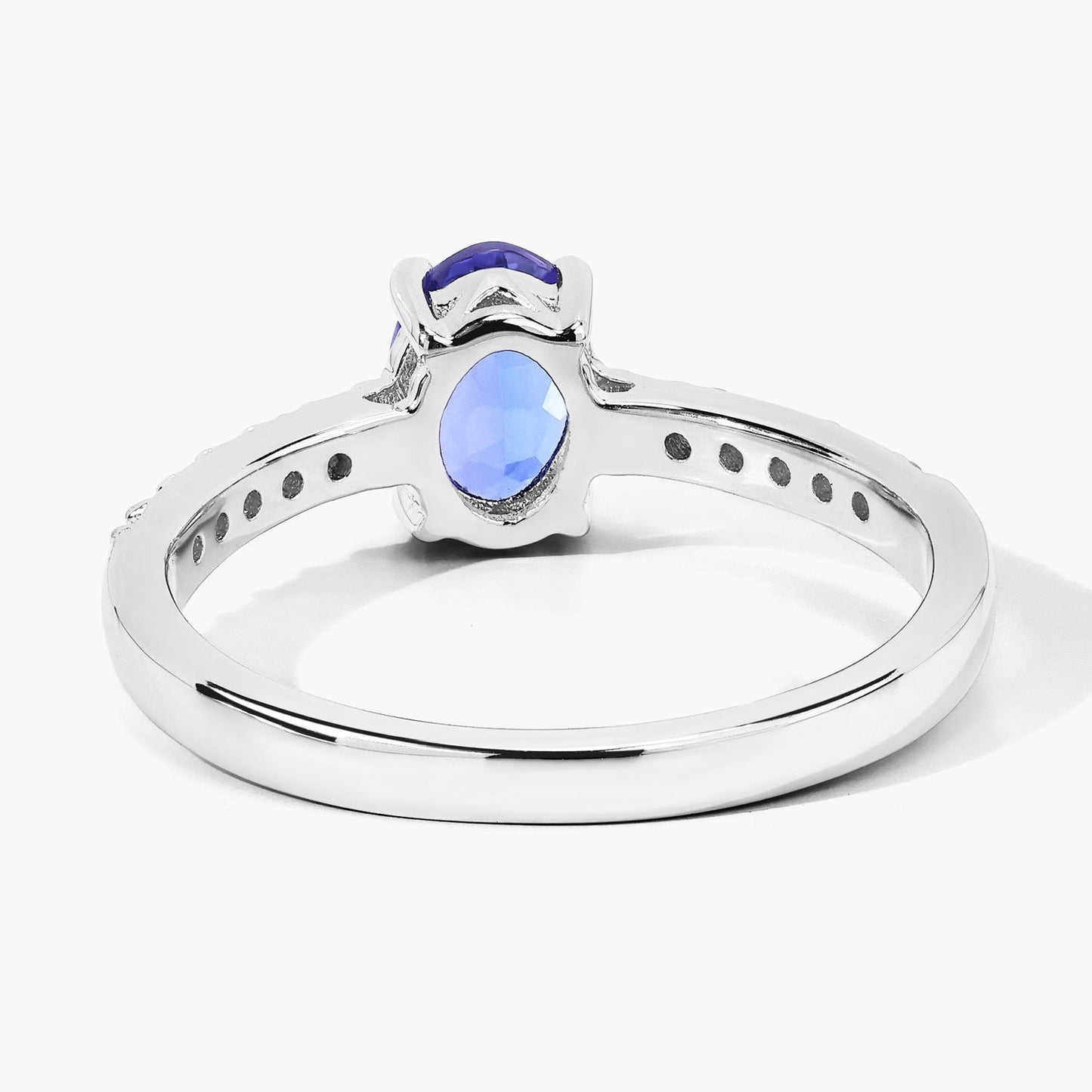 0.75 Ct Oval Violet Tanzanite and Lab Diamond Prong Silver Pave Band Ring