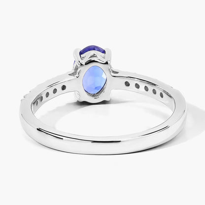 0.75 Ct Oval Violet Tanzanite and Lab Diamond Prong Silver Pave Band Ring