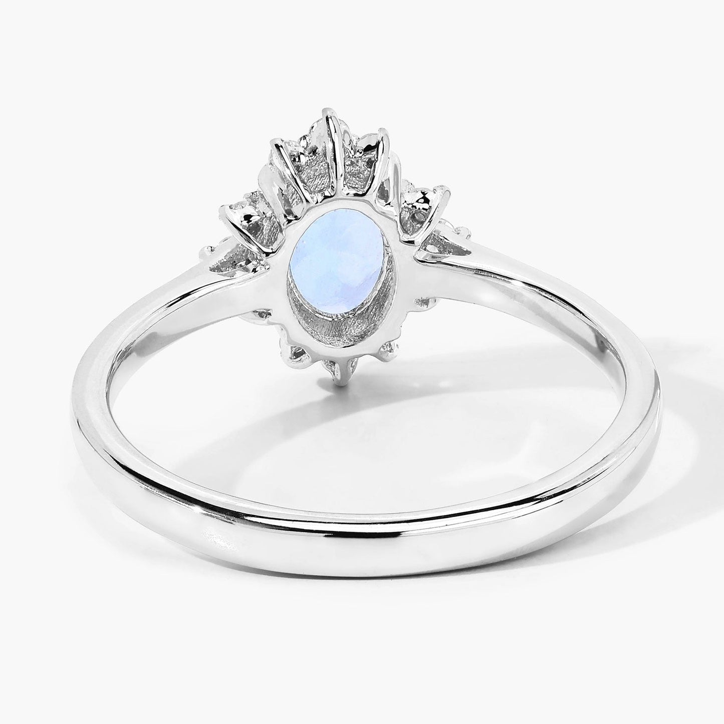 0.60 Ct Oval Blue Aquamarine and Lab Diamond Silver Halo Statement Ring
