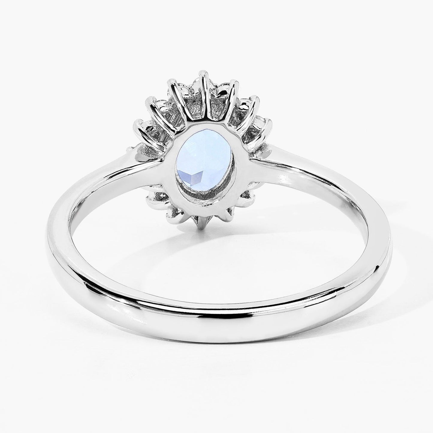 0.60 Ct Oval Blue Aquamarine and Lab Diamond Prong Sterling Silver Halo Ring