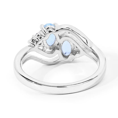0.80 Ct Oval Blue Aquamarine and Lab Diamond Silver Bypass Promise Ring