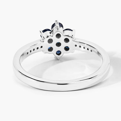0.49 Ct Round Blue Sapphire and Lab Diamond Prong Silver Pave Floral Ring