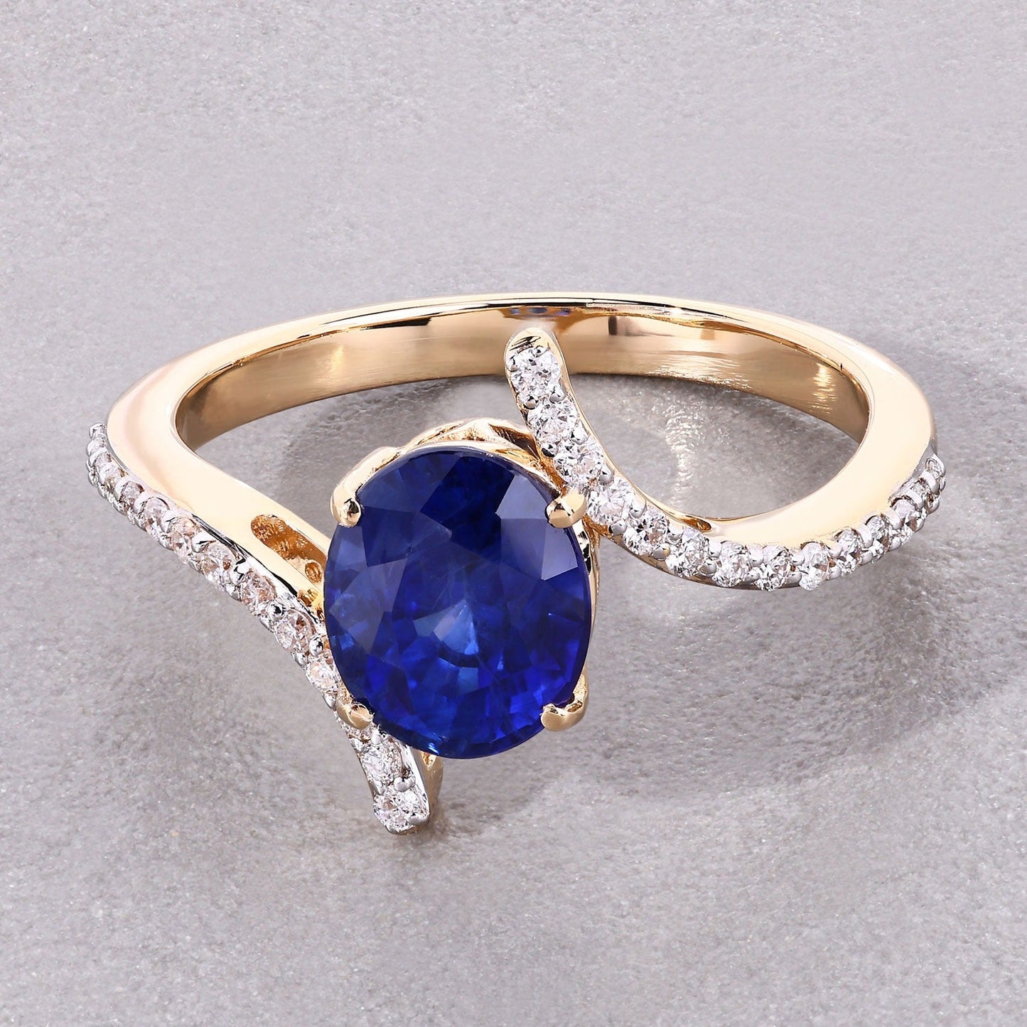 2.42 Ct Oval Ceylon Blue Sapphire and White Diamond Prong 18K Yellow Gold Pave Bypass Ring