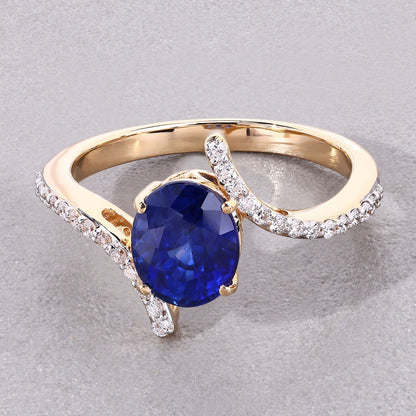 2.42 Ct Oval Ceylon Blue Sapphire and White Diamond Prong 18K Yellow Gold Pave Bypass Ring