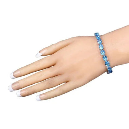 35.20 Ct Oval Swiss Blue Topaz Prong Sterling Silver Tennis Bracelet