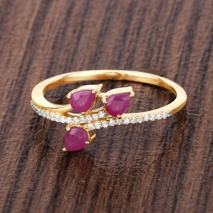 0.60 Ct Pear Pink Ruby & Diamond Prong 14K Yellow Gold Pave Bypass Three Stone Ring