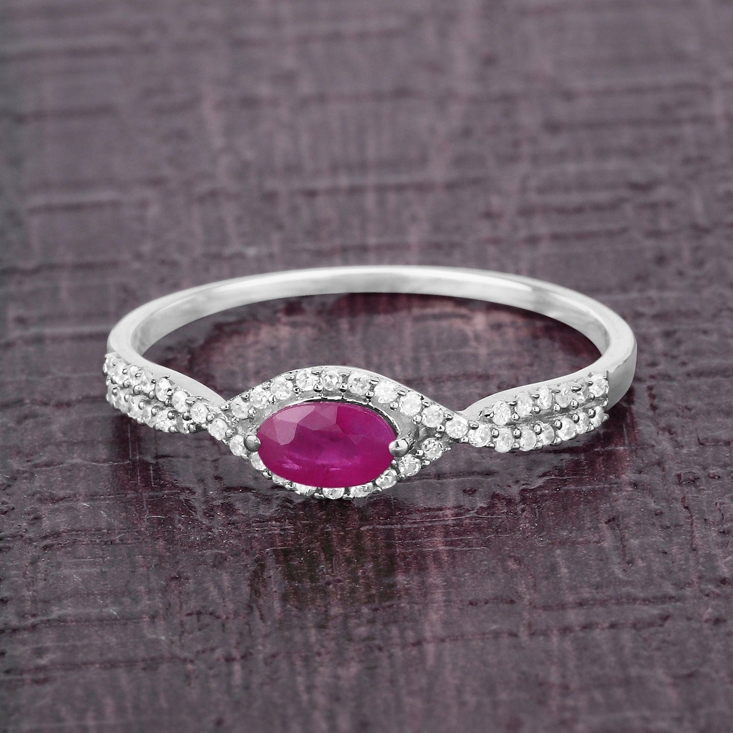 0.27 Ct Oval Pink Ruby & White Diamond Prong 14K White Gold Crossover Halo Ring