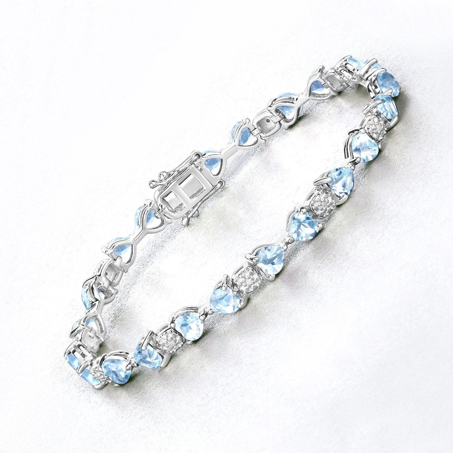 11 Ct Heart Blue Topaz Prong Silver Tennis Bracelet