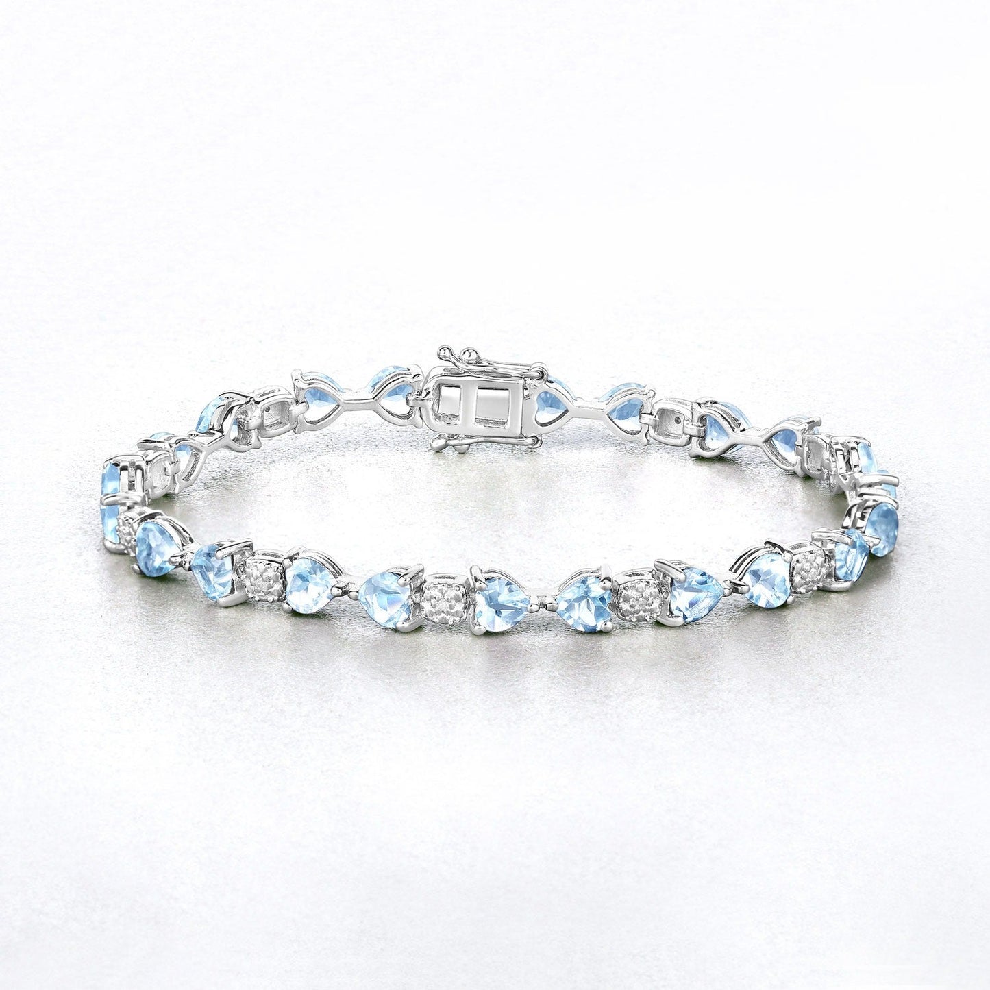 11 Ct Heart Blue Topaz Prong Silver Tennis Bracelet