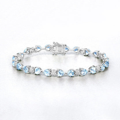11 Ct Heart Blue Topaz Prong Silver Tennis Bracelet