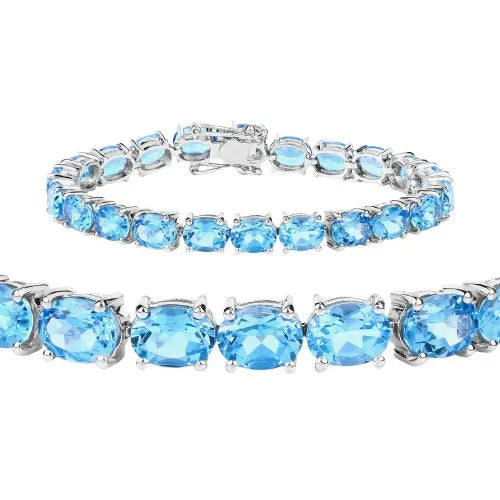 35.20 Ct Oval Swiss Blue Topaz Prong Sterling Silver Tennis Bracelet
