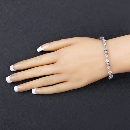 11 Ct Heart Blue Topaz Prong Silver Tennis Bracelet