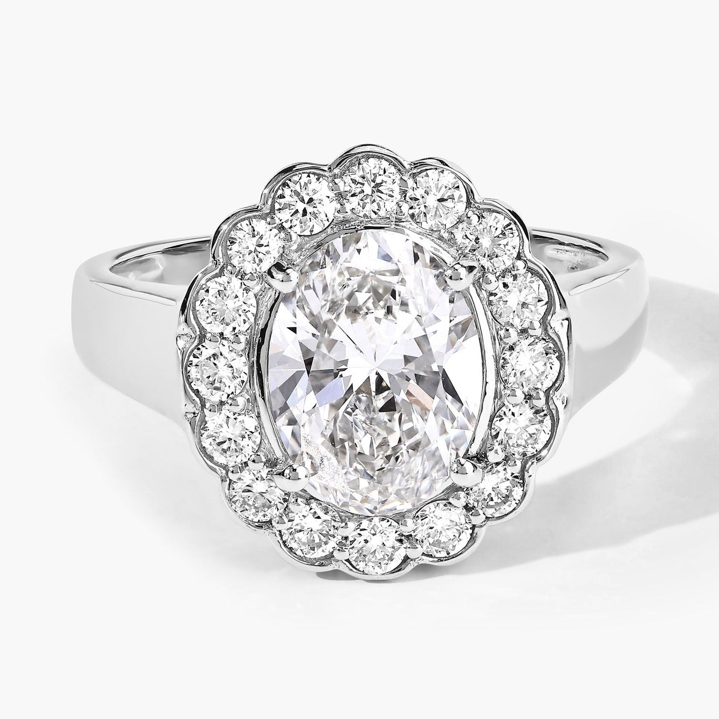 2.48 Ct Oval Lab Grown Diamond Prong Platinum Floral Halo Bridal Ring