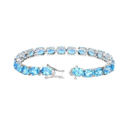 35.20 Ct Oval Swiss Blue Topaz Prong Sterling Silver Tennis Bracelet