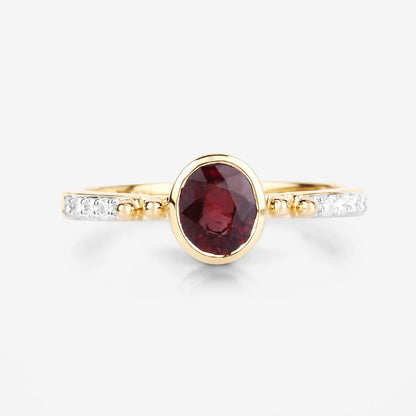 1.00 Cttw Oval Red Ruby and Diamond Pave 14K Yellow Gold Bridge Ring