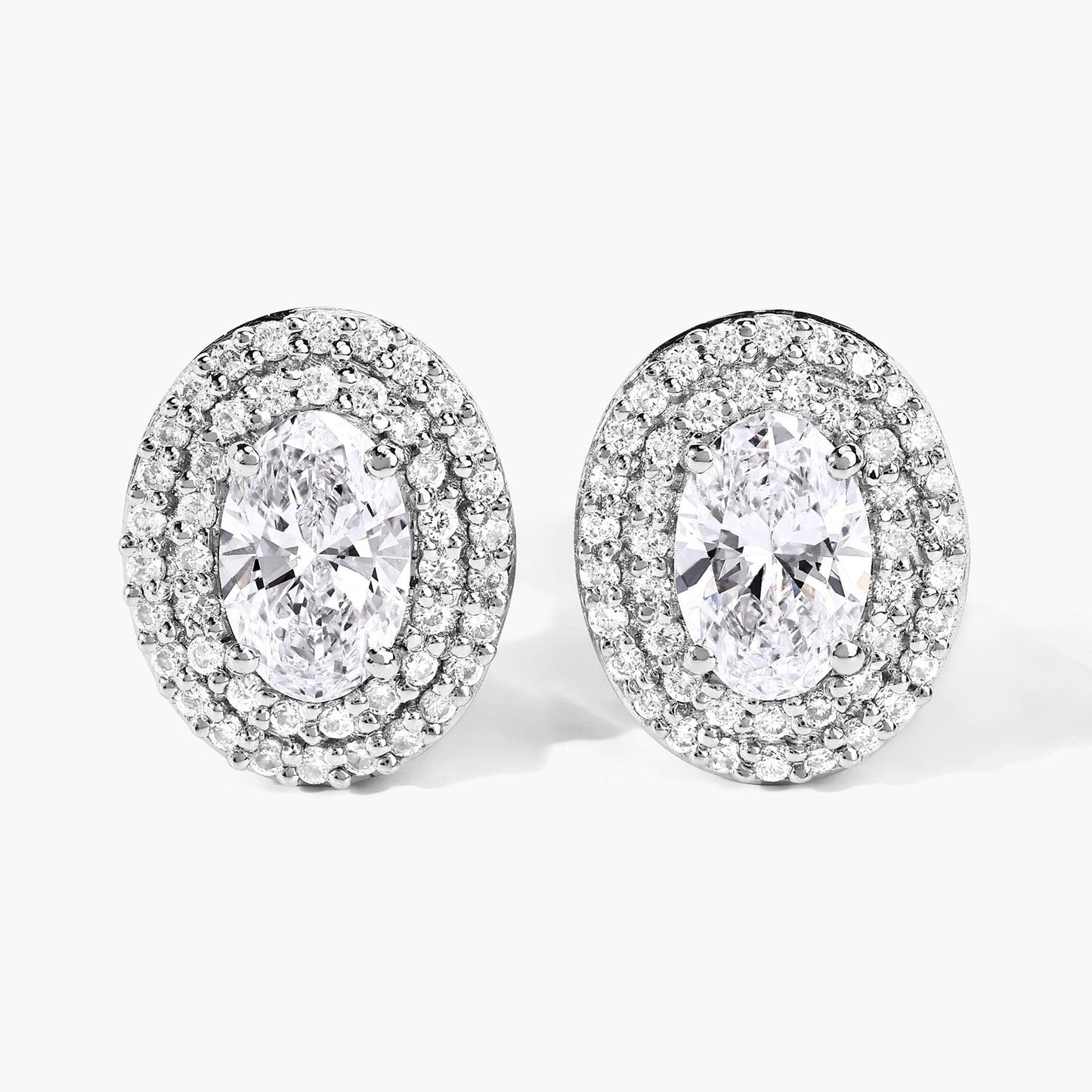 1.32 Ct. Oval Lab Grown Diamond Prong Platinum Double Bridal Halo Stud Earrings